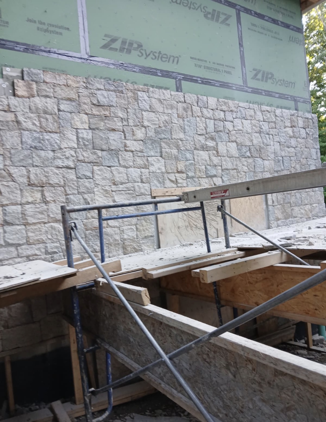 Historic chimney brick pointing and vertical mortar restoration in Massachusetts by Castone Masonry