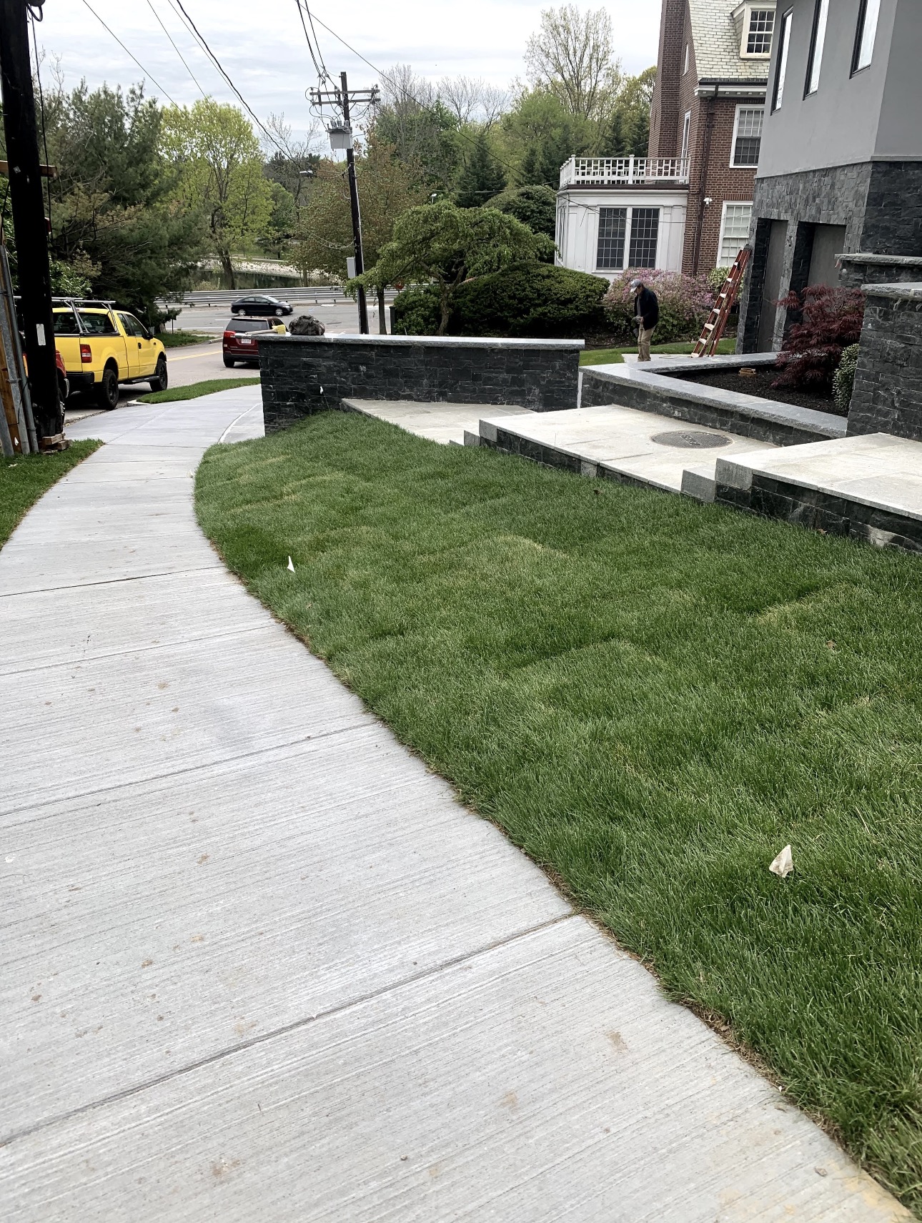 Traditional dry-stack fieldstone boundary wall layout in Osterville MA